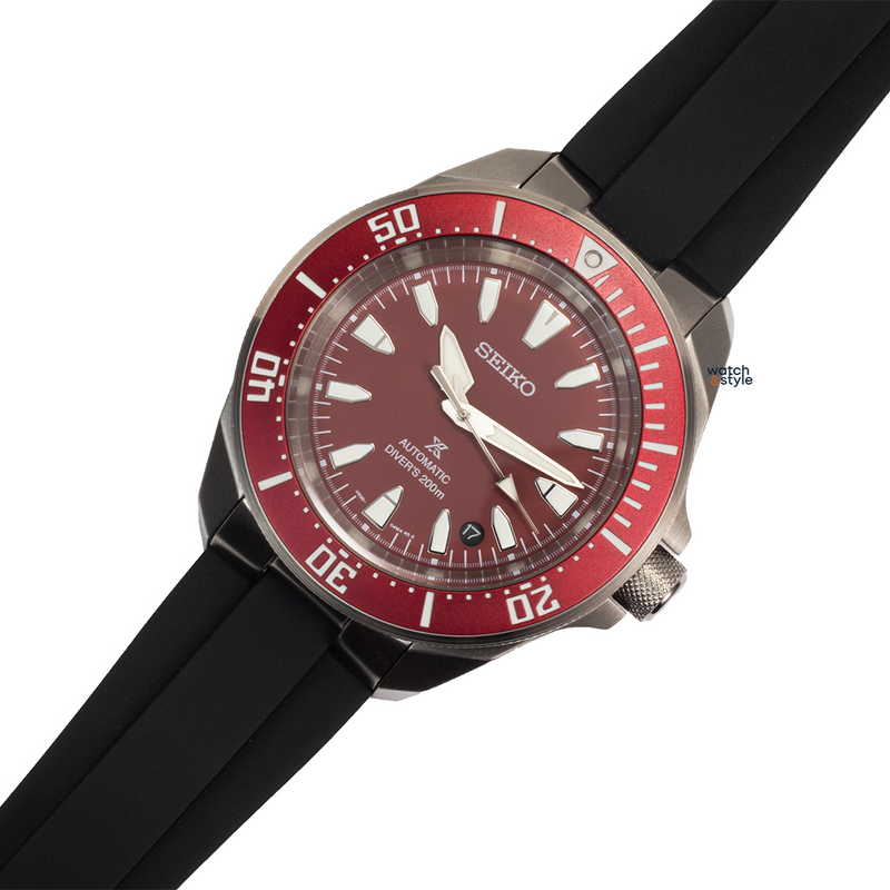 Seiko SRPL Shogurai diver with a red dial and red bezel, angled, on the RS1719 black FKM rubber strap